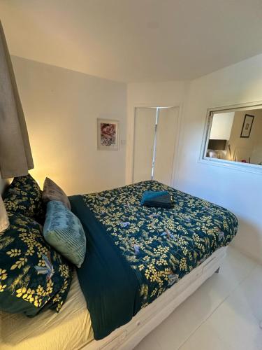 Ένα ή περισσότερα κρεβάτια σε δωμάτιο στο Le Cosy