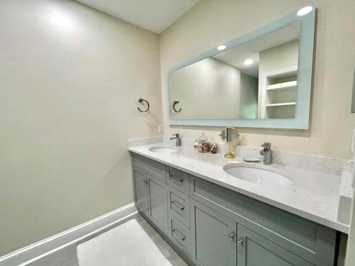 a bathroom with a sink and a mirror at Broad hollow 5 in Rehoboth Beach