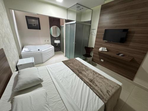 Katil atau katil-katil dalam bilik di Hotel Suites Flex Inn