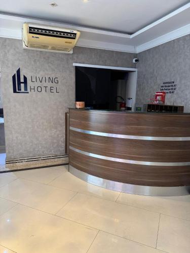 Lobi atau kawasan kaunter penerimaan di Hotel Suites Flex Inn