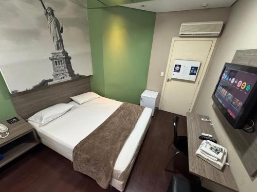 Katil atau katil-katil dalam bilik di Hotel Suites Flex Inn