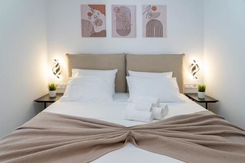 Ένα ή περισσότερα κρεβάτια σε δωμάτιο στο The White House minimal apartments