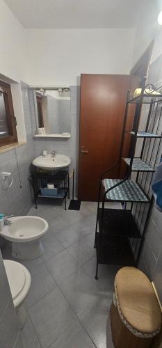 Koupelna v ubytování Leoncorno villasimius