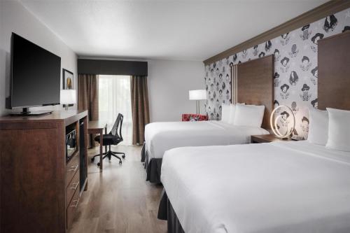 Postel nebo postele na pokoji v ubytování Aiden Austin City Hotel