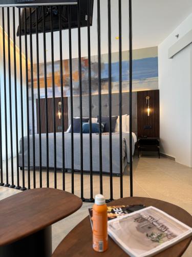 a hotel room with a bed in a room at Caesar Premier Eilat Hotel in Eilat