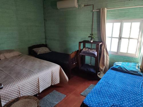 Una cama o camas en una habitación de Cabaña los teros