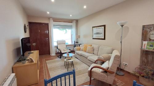 TV a/nebo společenská místnost v ubytování Casa Cortegada