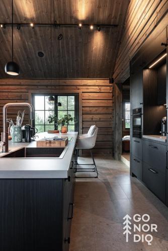 a kitchen with a sink and a counter top at The Lazy Moose in Tällberg