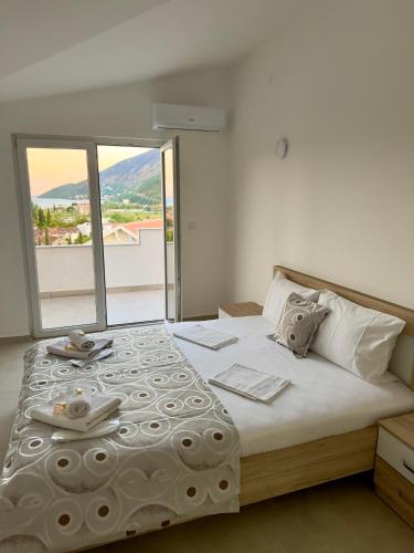 Postel nebo postele na pokoji v ubytování Apartments Hana