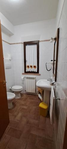 Koupelna v ubytování Affittacamere ALBA FIORITA