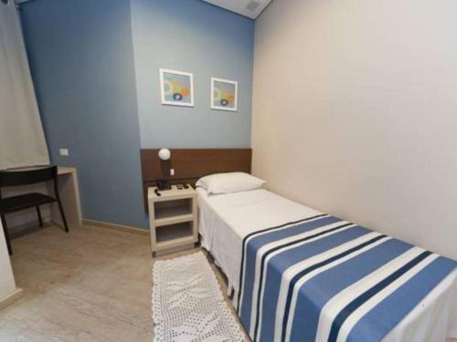 Postel nebo postele na pokoji v ubytování Hotel Sol By MRHotelaria
