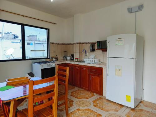 Kuchyň nebo kuchyňský kout v ubytování Teresita's House Suites con cocina privada