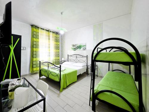 Postel nebo postele na pokoji v ubytování Mamma Lucia