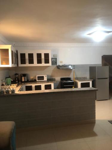 Kuchyň nebo kuchyňský kout v ubytování Apartamento Airbmb Penthouse de lujo Guadeca A