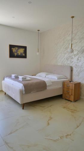 Una cama o camas en una habitación de Hotel Reset