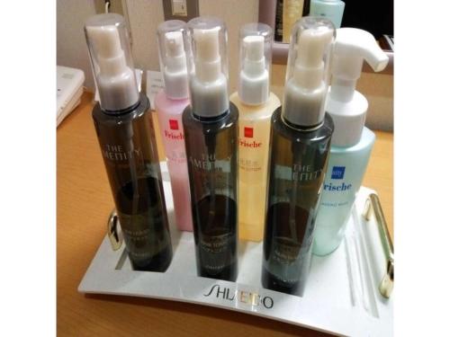 a group of five bottles of hair products on a table at Smile Hotel Hirosaki - Vacation STAY 40505v in Hirosaki