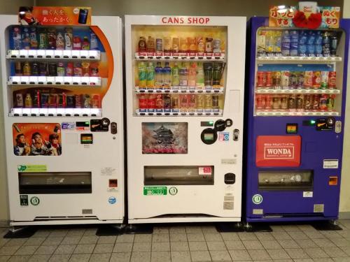 two refrigerators with drinks in them in a store at Smile Hotel Hirosaki - Vacation STAY 40509v in Hirosaki