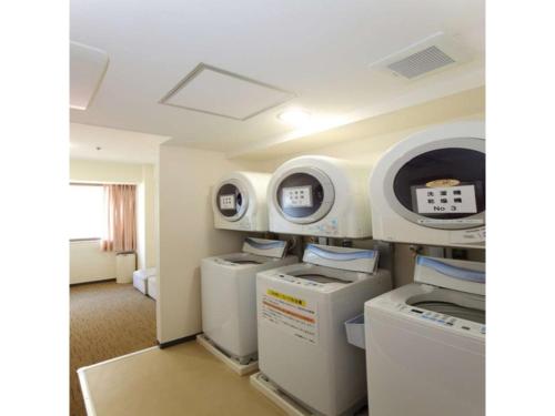 a room with a hospital room with machines at Smile Hotel Hirosaki - Vacation STAY 40509v in Hirosaki