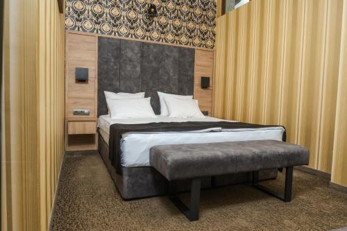 Ένα ή περισσότερα κρεβάτια σε δωμάτιο στο Paradise SPA Hotel