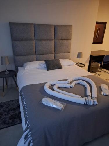 Postel nebo postele na pokoji v ubytování Kliprivier Accommodation