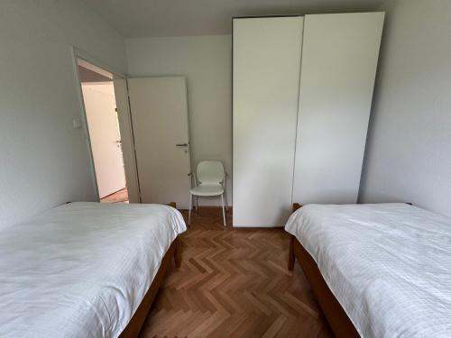 Postel nebo postele na pokoji v ubytování ANMARI Apartment & Rooms