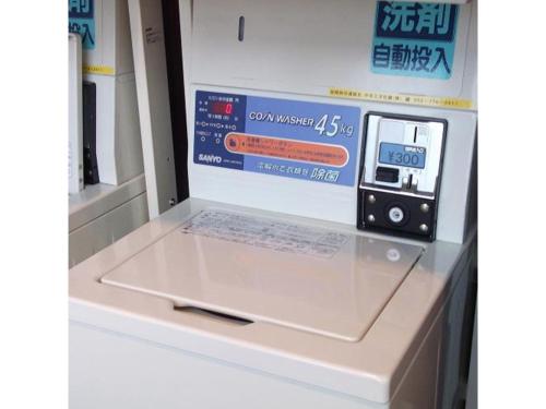 a machine in a store with a sign on it at Quad Inn Yokote - Vacation STAY 57398v in Yokote