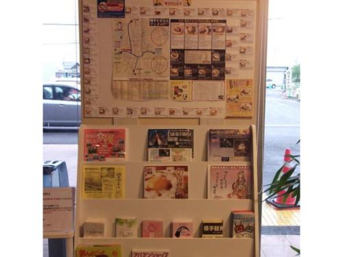 a bulletin board with magnets on a wall at Quad Inn Yokote - Vacation STAY 57397v in Yokote