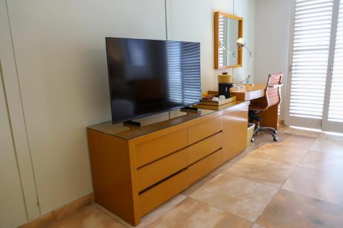 Телевизор и/или развлекательный центр в Palacio Mundo Imperial Riviera Diamante Acapulco All Inclusive
