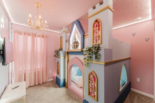 a play room with a castle themed bedroom at Spacious 9BR Home w Private PoolGame Room in Davenport