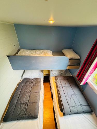 Кровать или кровати в номере Mobilhome