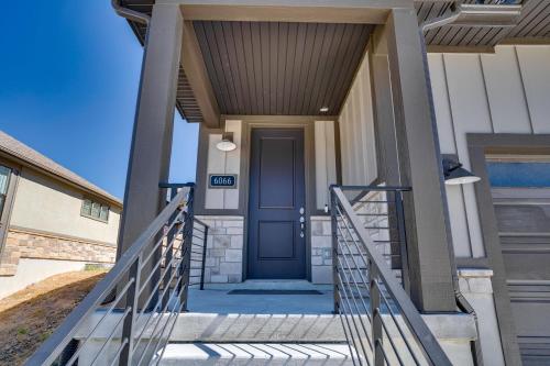 a front door of a house with a blue door at Heber Retreat by Xquisite Rentals in Heber City
