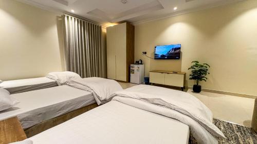 Katil atau katil-katil dalam bilik di Rewaq resident