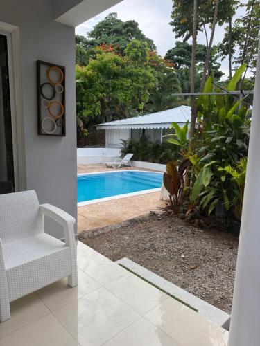 a view of a swimming pool from a house at Villa Gaston in Las Terrenas