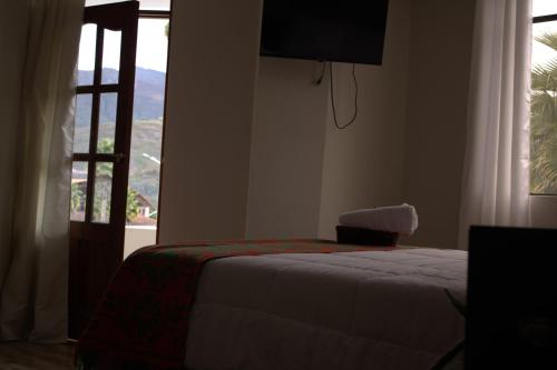 Μια τηλεόραση ή/και κέντρο ψυχαγωγίας στο Hospedaje El Castillo
