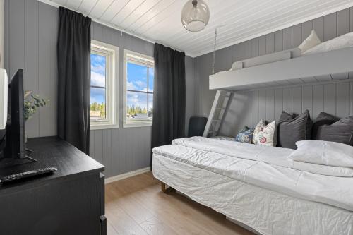 Postel nebo postele na pokoji v ubytování Trysilfjell 786 by Vacation Trysil