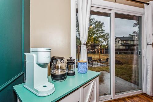 a kitchen counter with a blender on top of it at Theater, King&PoolTable with PrivateHotTub in The Dell