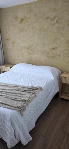 En eller flere senge i et værelse på Departamento Semipiso nuevo en Mar del Plata