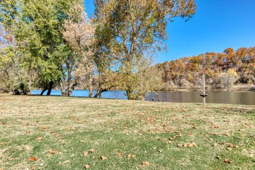 a park with trees and a body of water at New River 3BR - Fishing, Hot Tub and VT Game Weekends in Radford