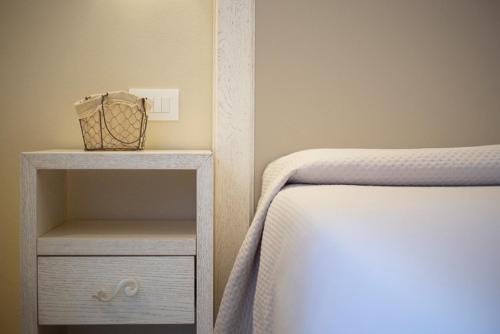 Postel nebo postele na pokoji v ubytování Podere Grandolfi B&B