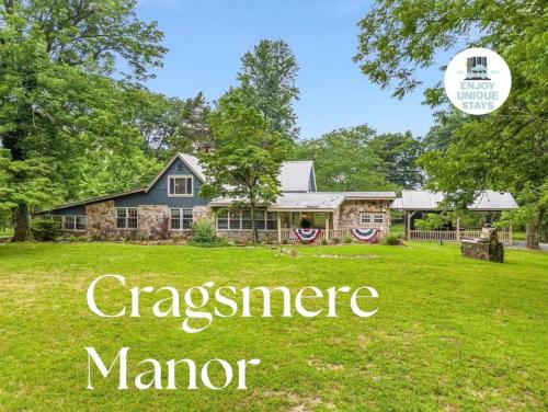 a house on a lawn with the words chesapeake manor at Cragsmere Manor - Luxury Estate & Event Space in Mentone