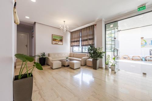 Zona de estar de Hotel Kompleks Joni