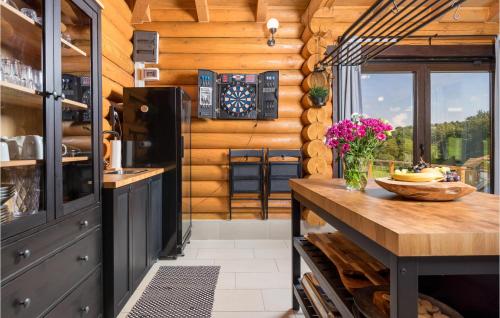 a kitchen in a tiny house with a counter at Amazing Home In Petrinja With Wi-Fi in Petrinja