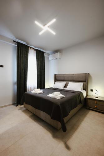 Postel nebo postele na pokoji v ubytování Siel simple elegance Volos