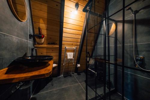 a bathroom with a sink and a toilet at MC Sapanca Hotel in Sakarya