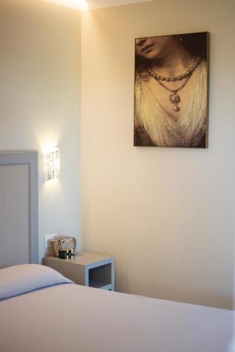 Postel nebo postele na pokoji v ubytování Podere Grandolfi B&B