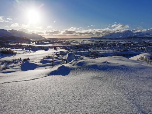 an aerial view of a town in the snow at Lofoten Apartment 02 in Leknes