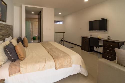 Hotel San Martin Popayanにあるベッド
