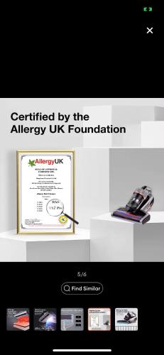 a sign for the air frequency uk foundation on a display at Pastora House Luxe Staycation Bauan Batangas in Bauan