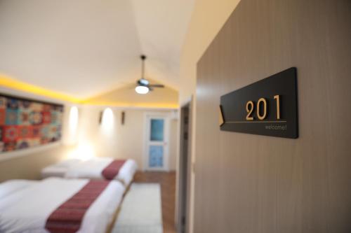 Postel nebo postele na pokoji v ubytování Rainbow Hoilday Resort