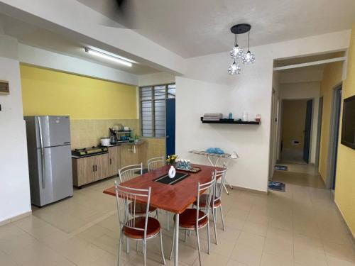 Kuchyň nebo kuchyňský kout v ubytování Sunny Grove 3 ROOMS by EZYHOME MELAKA